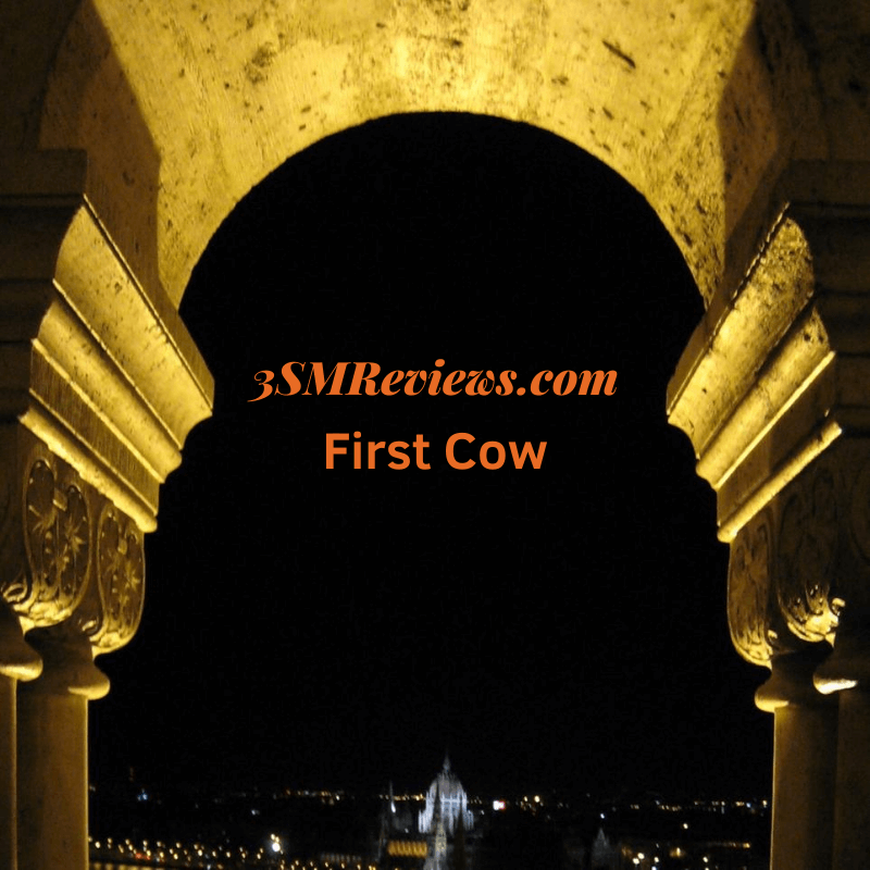 An arch with text that reads: 3SMReviews.com. First Cow.